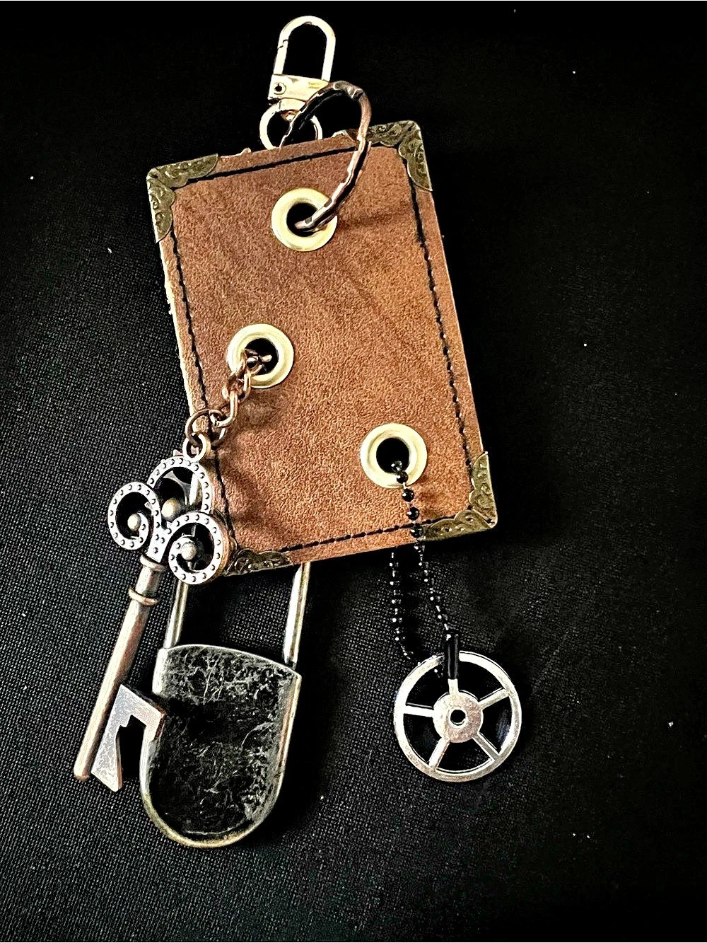 Brown and metal Keychain Charm